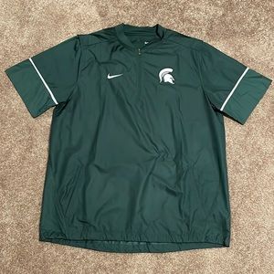 Michigan state Nike coaches jacket 1/4 zip short sleeve size X-Large.